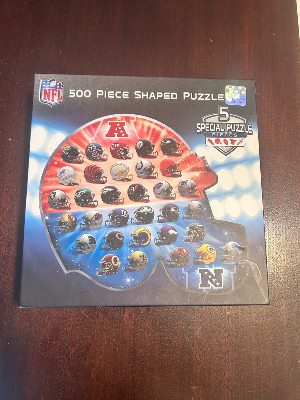 NFL 500-Piece Shaped Puzzle - Red & Blue Helmet Collage